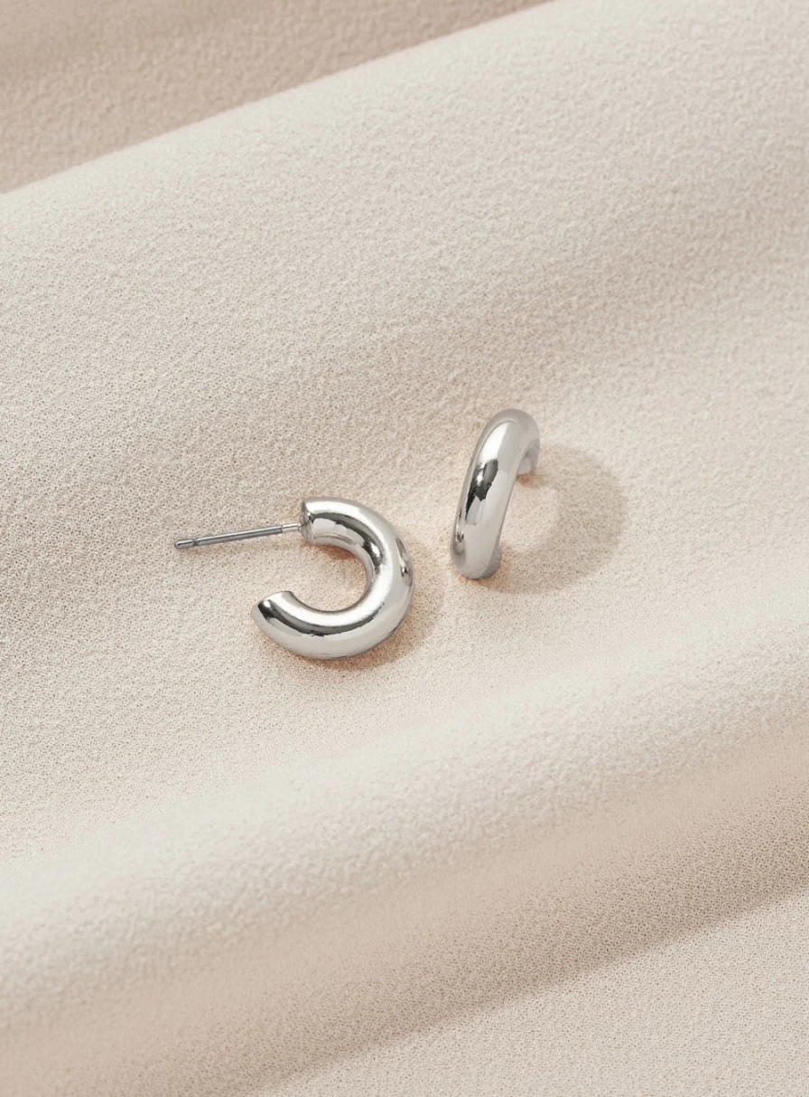 "Olive & Piper Baby Icon Hoops - Elegant Gold-Plated Huggie Earrings for Infants"