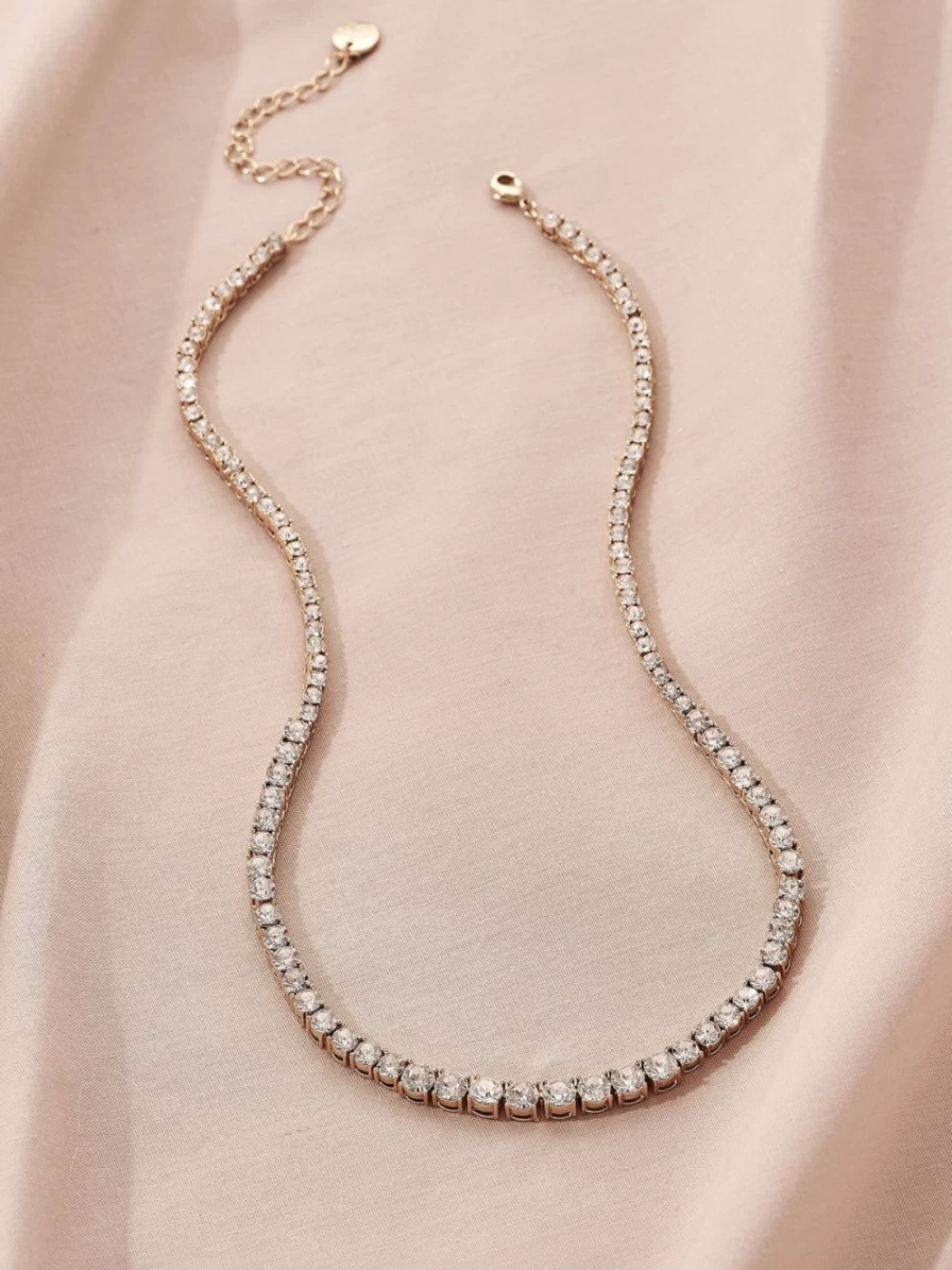 "Olive & Piper Octavia Crystal Necklace in Ox Gold – Elegant Gold-Tone Statement Jewelry"